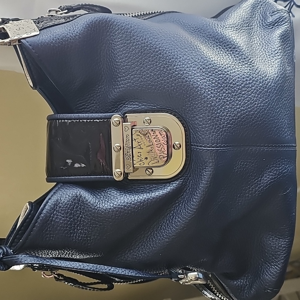 Brighton handbag.  Blue and white. Vintage at this point,  pristine condition